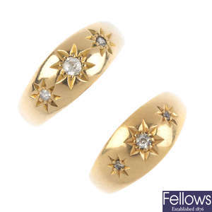 Two Edwardian 18ct gold diamond three-stone rings.