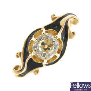 A late 19th century gold diamond and enamel single-stone ring.