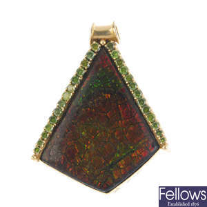 A colour treated 'green' diamond and ammolite doublet pendant.