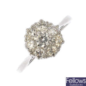 A diamond cluster ring. 