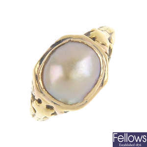 A mid Victorian split pearl ring. 