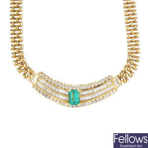 An 18ct gold emerald and diamond necklace. 