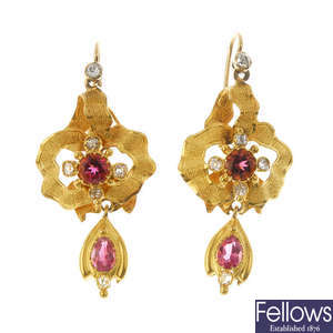 A pair of diamond and tourmaline earrings.