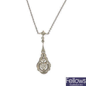 An early 20th century gold diamond pendant.