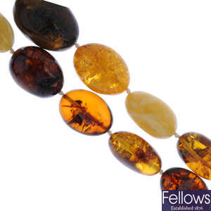 A natural and modified amber bead necklace.