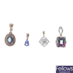Six gem-set pendants, one with chain.