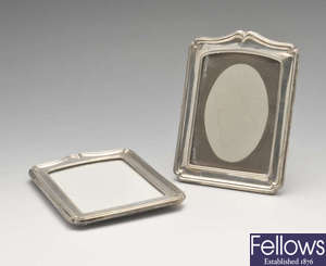 A pair of George V silver mounted photograph frames.