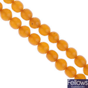 Two reconstructed amber bead necklaces.