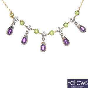 A gem-set necklace.