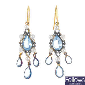 A pair of topaz and seed pearl earrings.