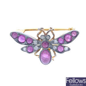 A ruby and diamond fly brooch.