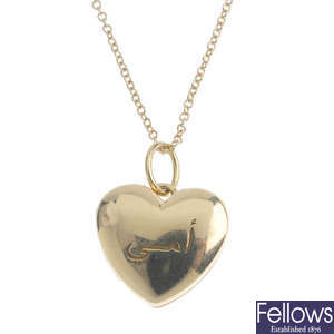 TIFFANY & CO. - a heart locket, with chain.
