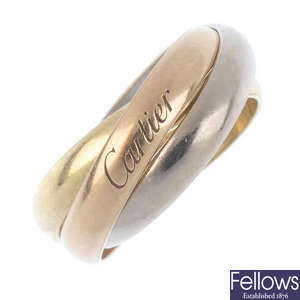 CARTIER - an 18ct gold 'trinity' ring.
