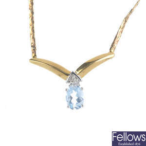 A 9ct gold topaz and diamond necklace.
