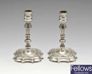 A pair of modern silver tapersticks in Georgian style.