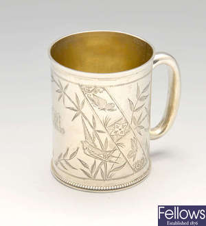 A Victorian silver christening mug decorated in Aesthetic style.