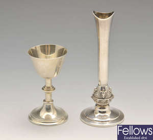 A 1920's small silver chalice goblet & a later silver bud vase. (2).