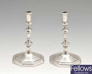 A pair of late Victorian silver tapersticks.