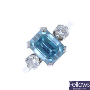 A zircon and diamond three-stone ring.