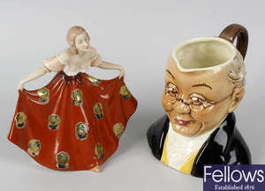 A small Royal Dux figurine, modelled as a curtseying lady, a pair of large porcelain vases, etc.
