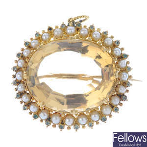 A mid Victorian gold gem-set brooch.