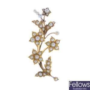 An early 20th century gold seed and split pearl floral spray brooch.