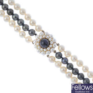 A cultured pearl three-strand necklace, with 9ct gold clasp.
