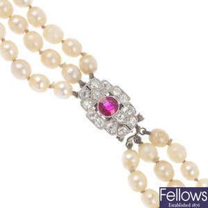 A cultured pearl three-row necklace, with Art Deco synthetic ruby and diamond clasp.