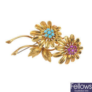 A mid 20th century gold ruby and turquoise flower brooch.