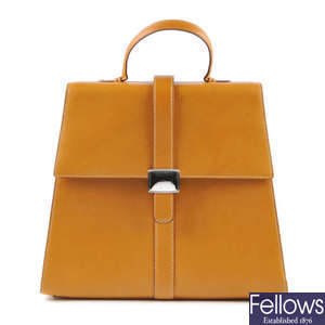TIFFANY & CO. - a tan leather handbag.