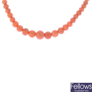 Two coral necklaces.