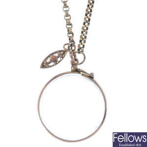 A photographic locket, with chain.