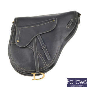 CHRISTIAN DIOR - a leather saddle crossbody handbag.