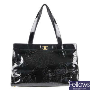CHANEL - a patent leather camellia tote.