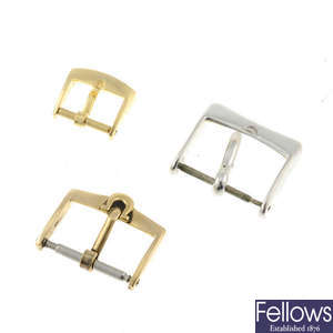 OMEGA - an 18ct yellow gold pin buckle with two other pin buckles.