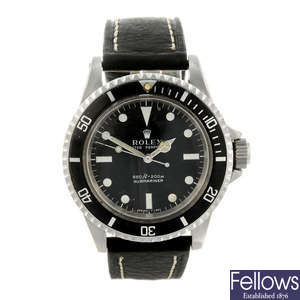 ROLEX - a gentleman's stainless steel Oyster Perpetual Submariner wrist watch.
