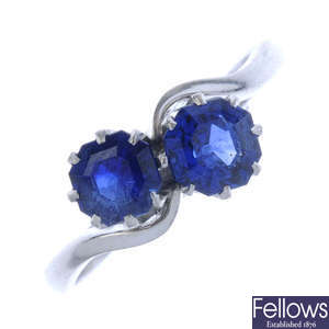 A sapphire two-stone crossover ring.