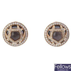 A pair of smoky quartz and diamond earrings.
