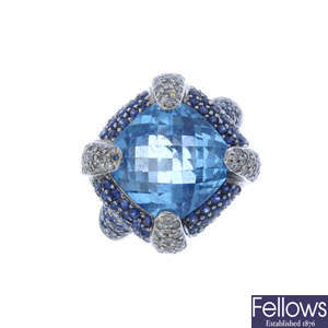 A topaz, diamond and sapphire ring.