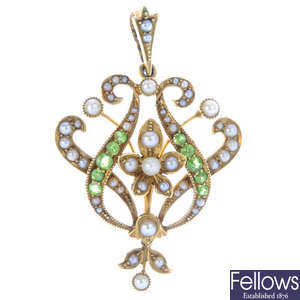 An Edwardian 15ct gold demantoid garnet, seed and split pearl pendant.