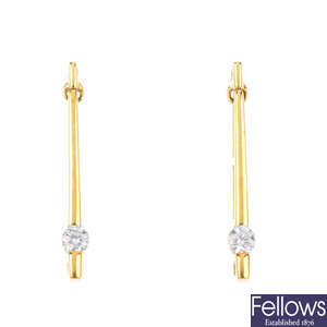 A pair of 18ct gold diamond drop earrings.