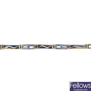 A 9ct gold amethyst and topaz bracelet.