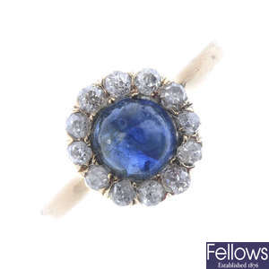 A mid 20th century gold sapphire and diamond cluster ring.