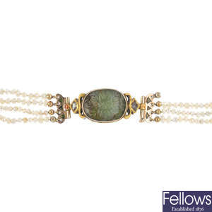 A seed pearl necklace, with gem-set enamel clasp.