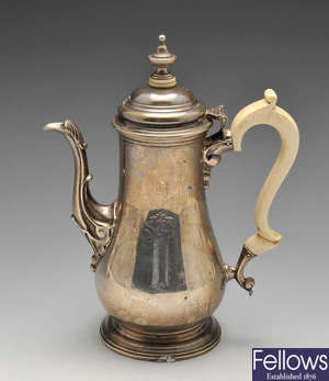 A 1920's silver coffee pot. 