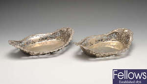 A pair of Edwardian silver pierced baskets.