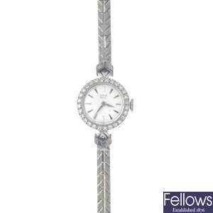 TUDOR - a lady's 1960s 9ct gold diamond manual wind cocktail watch.