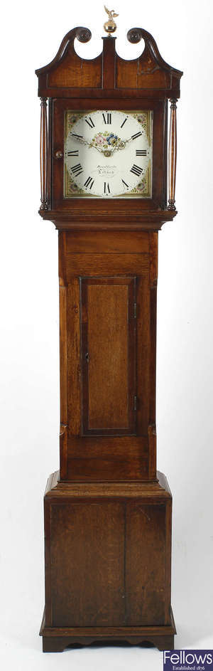 An early 19th century oak and mahogany longcase clock, Bradfords of Totnes.