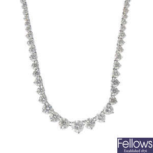 A diamond line necklace. 
