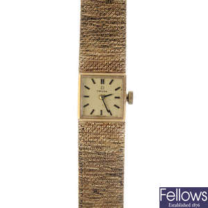 OMEGA - a lady's 1970s 9ct gold wristwatch.